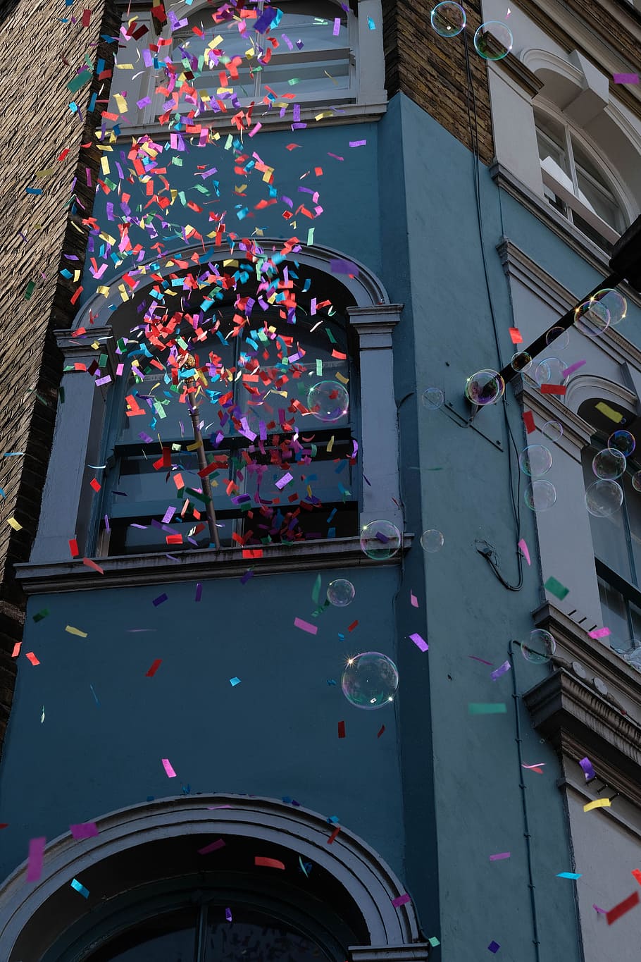low angle photography of concrete building at daytime, confetti HD wallpaper