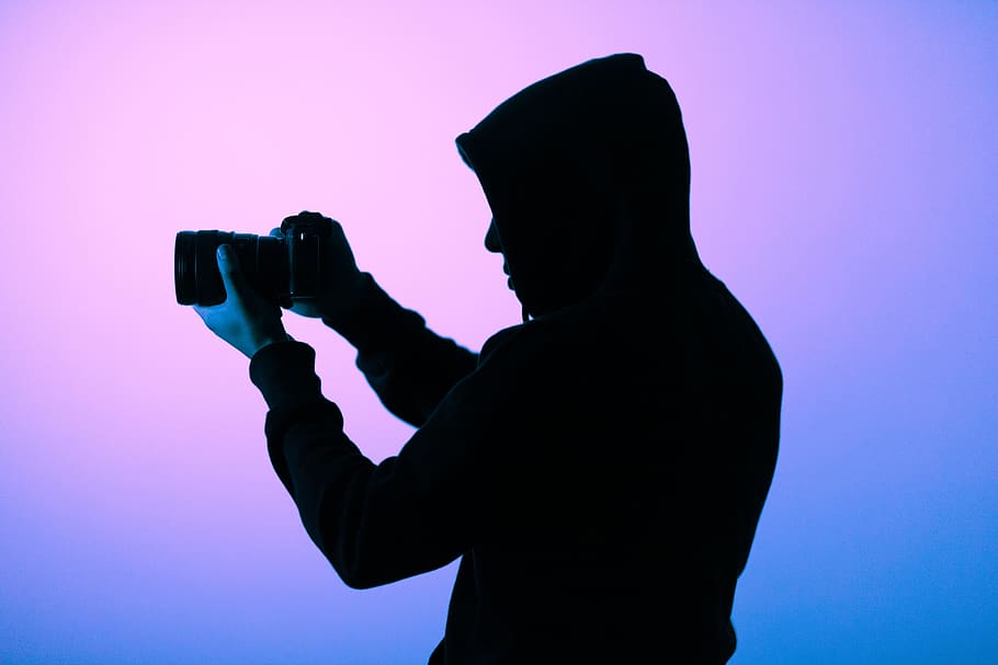 Man Holding Camera, art, backlit, blue, dark, hobby, hoodie, lens HD wallpaper