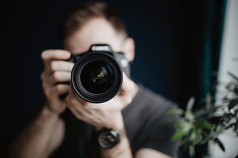 Young man taking photos, working, camera, photography, photographer HD wallpaper