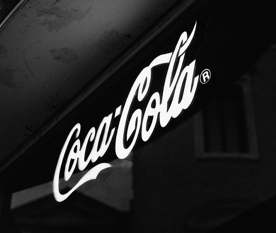 Coca-Cola sign, symbol, trademark, logo, alphabet, text, light