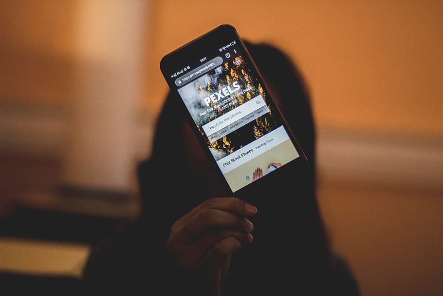 Person Holding Smartphone, display, electronics, macro, mobile HD wallpaper