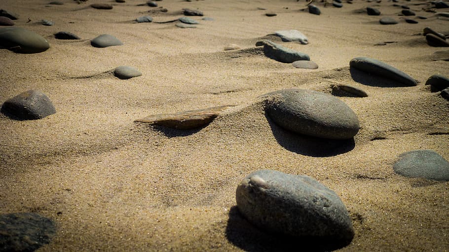 Closeup Photography of Assorted Stones on Brown Sand, beach, land HD wallpaper