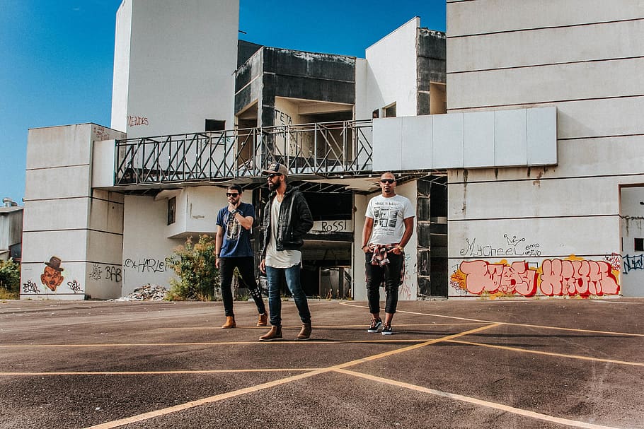 three men standing near building, person, human, clothing, apparel HD wallpaper