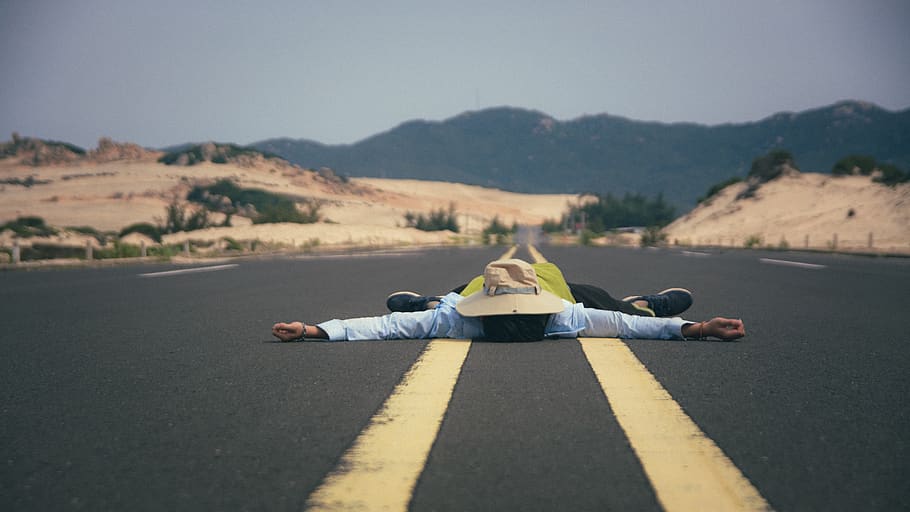 Man on Mountain Against Sky, asphalt, desert, dom, guy, highway HD wallpaper