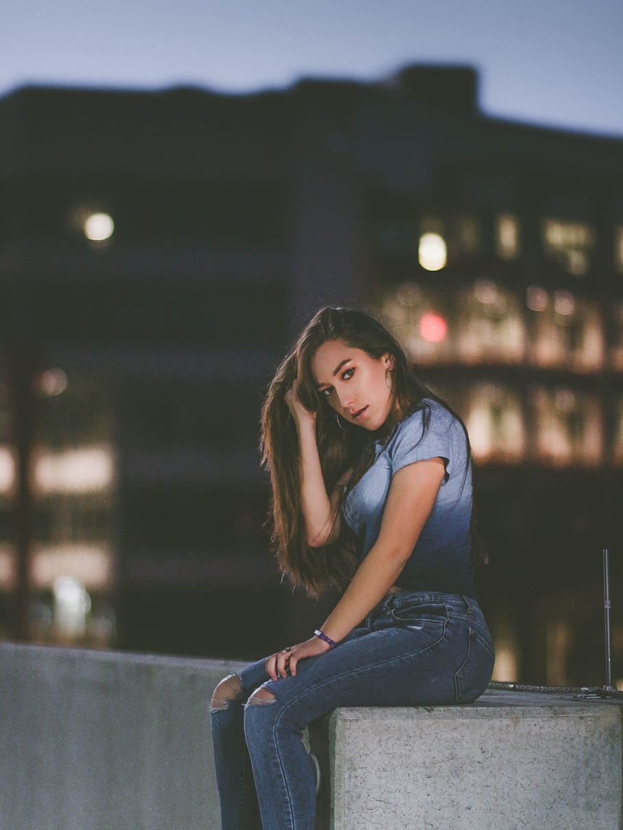 woman sitting on concrete block, blue, sunset, parking deck, brunette HD wallpaper