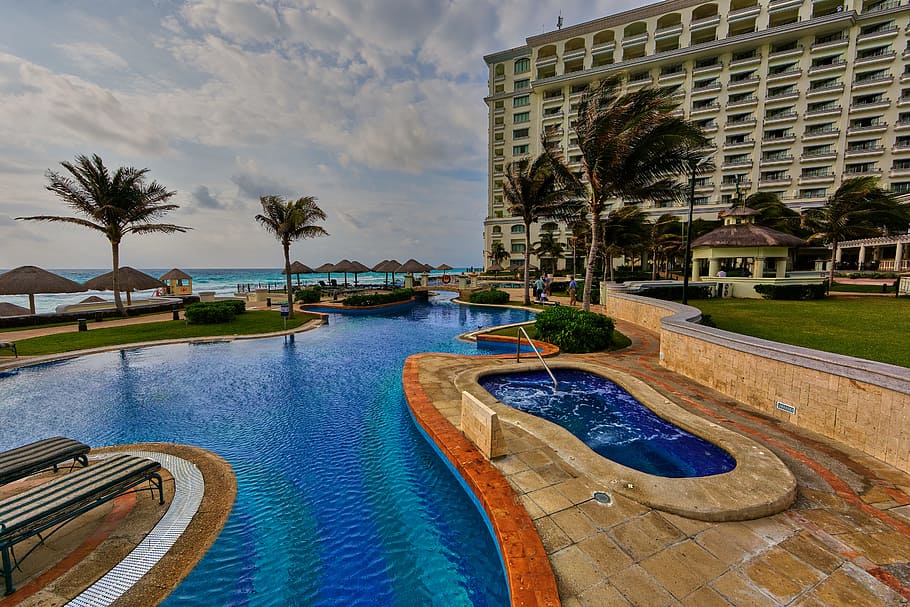 In-ground Pool Near Building during Daytime, architecture, beach HD wallpaper