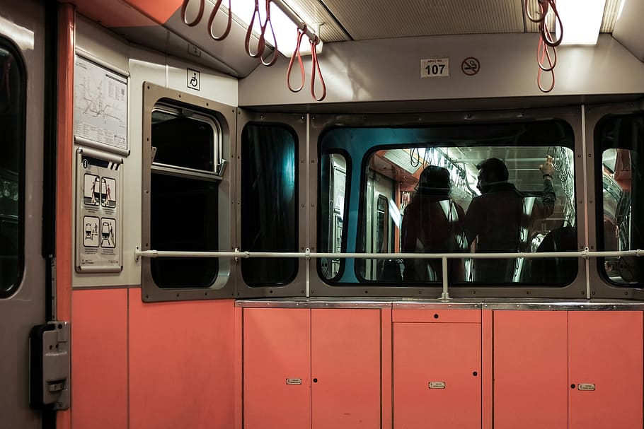 person standing inside train, human, transportation, vehicle HD wallpaper