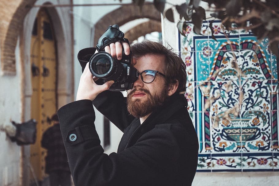 man standing and using DSLR cameta, one person, beard, real people HD wallpaper