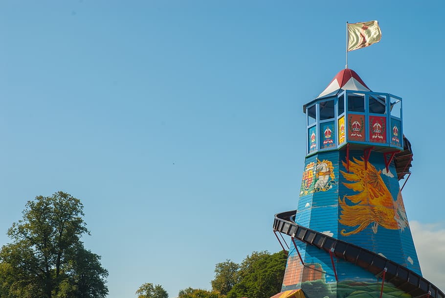 blue-and-multicolored-lighthouse-close-up-phtography.jpg