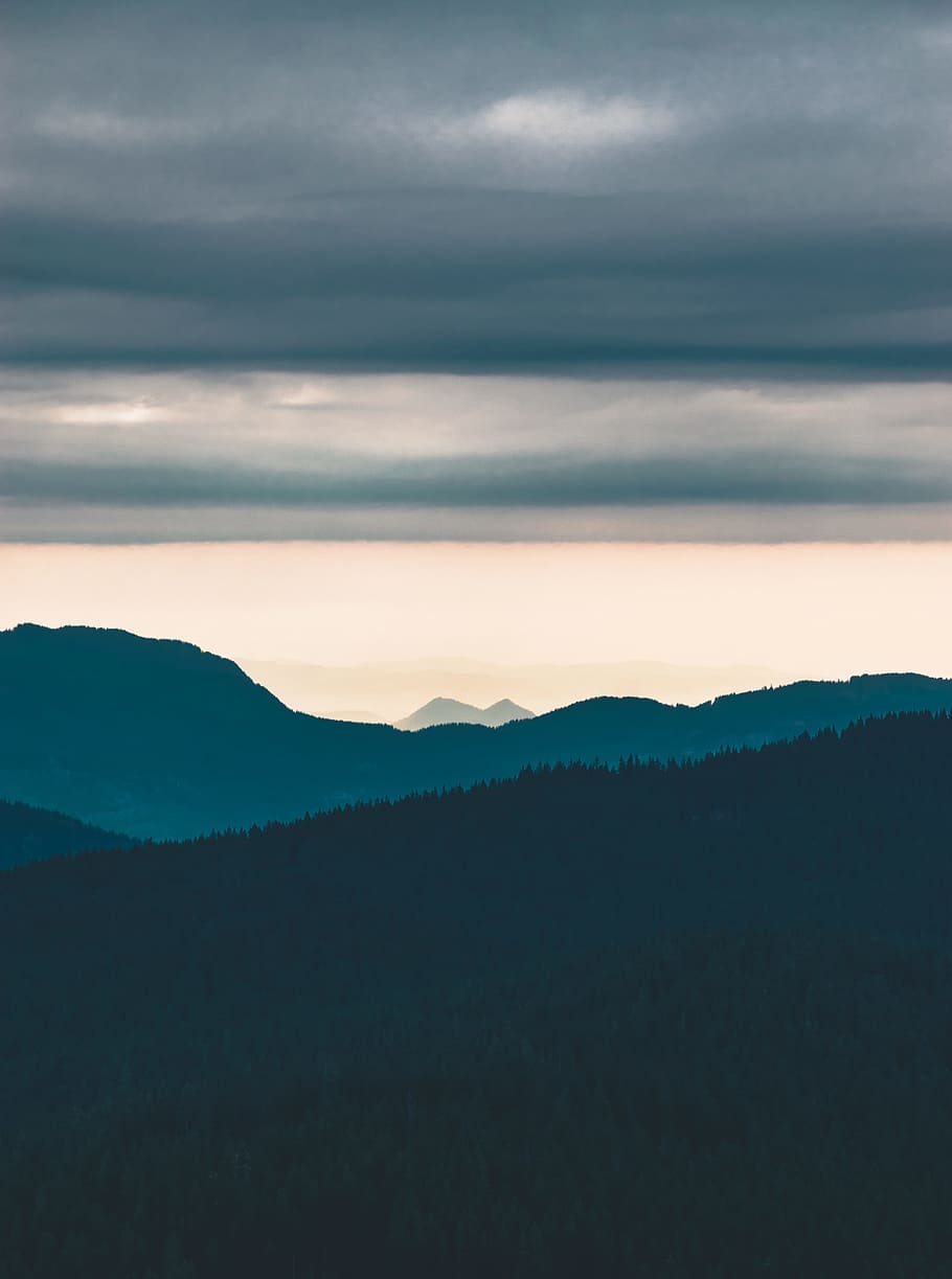 grey clouds over silhouette of tree covered hill, calm, evening HD wallpaper