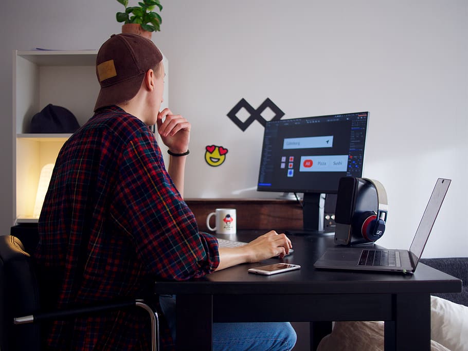 man sitting near table using computer, technology, one person HD wallpaper