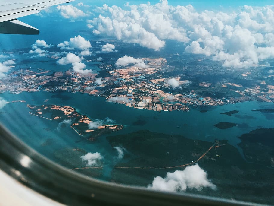 plane, view, nature, sky, clouds, ocean, island, airplane, window seat HD wallpaper