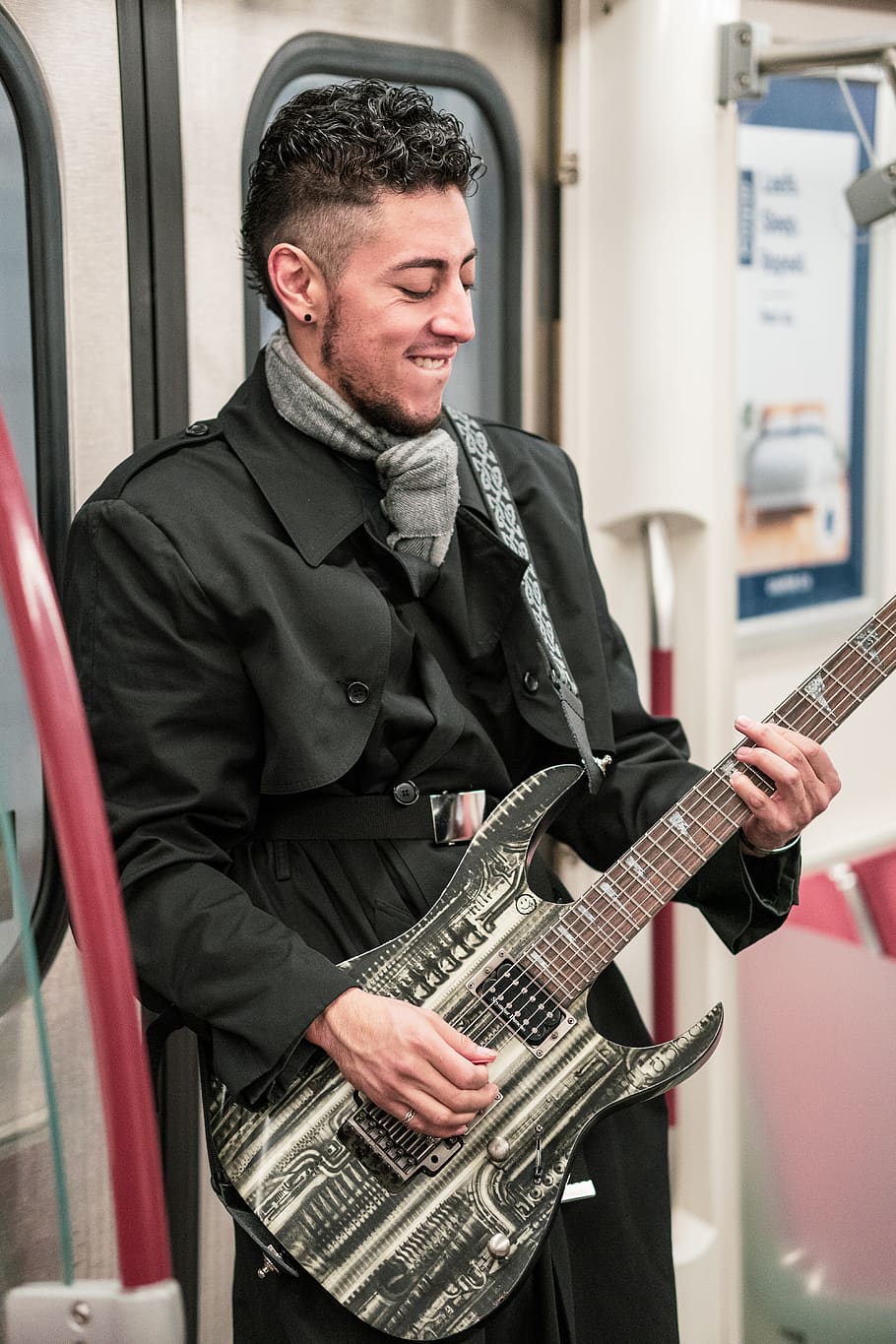 man playing electric guitar, person, human, musical instrument