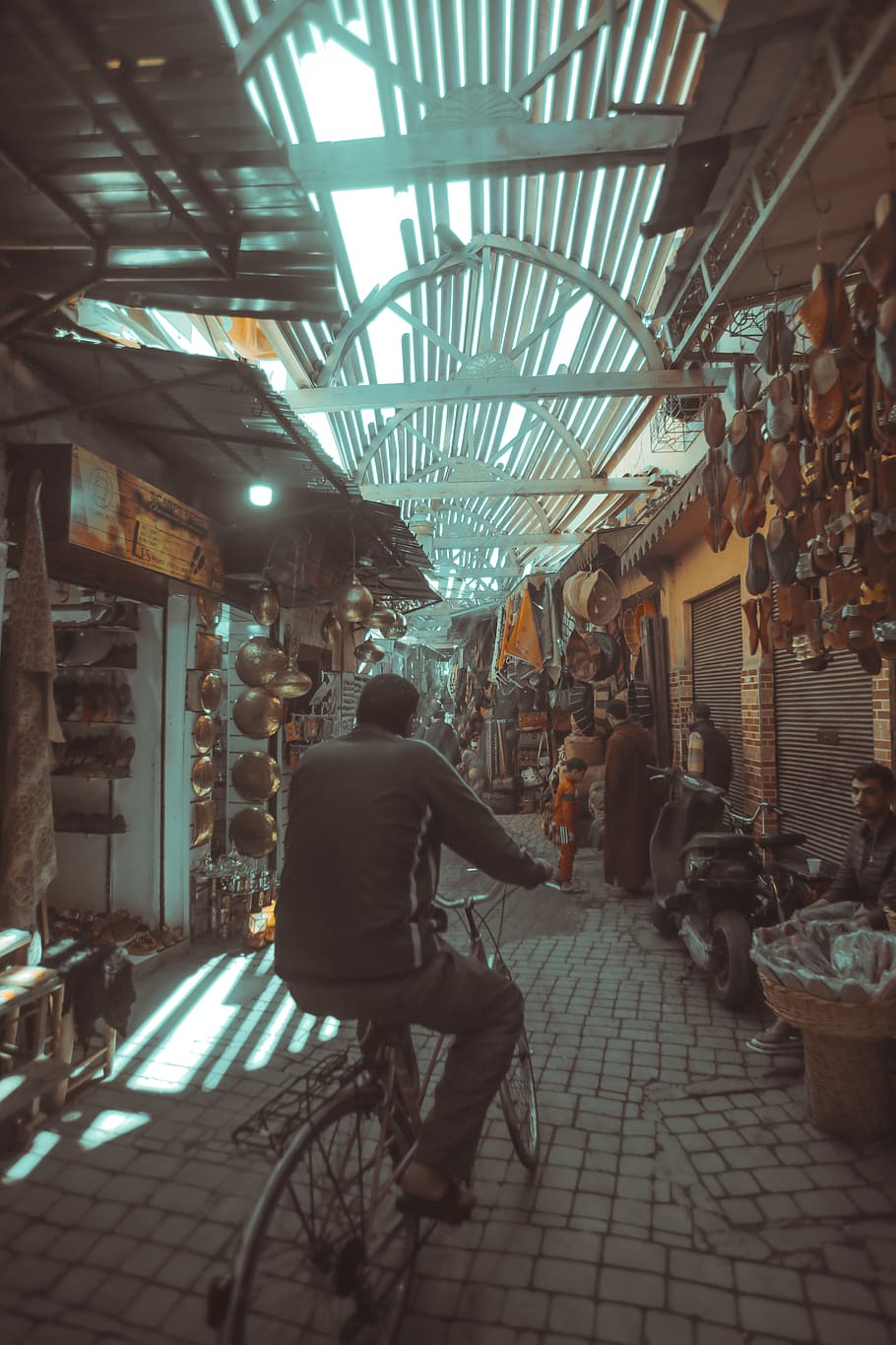 man riding bicycle between stores, full length, architecture HD wallpaper