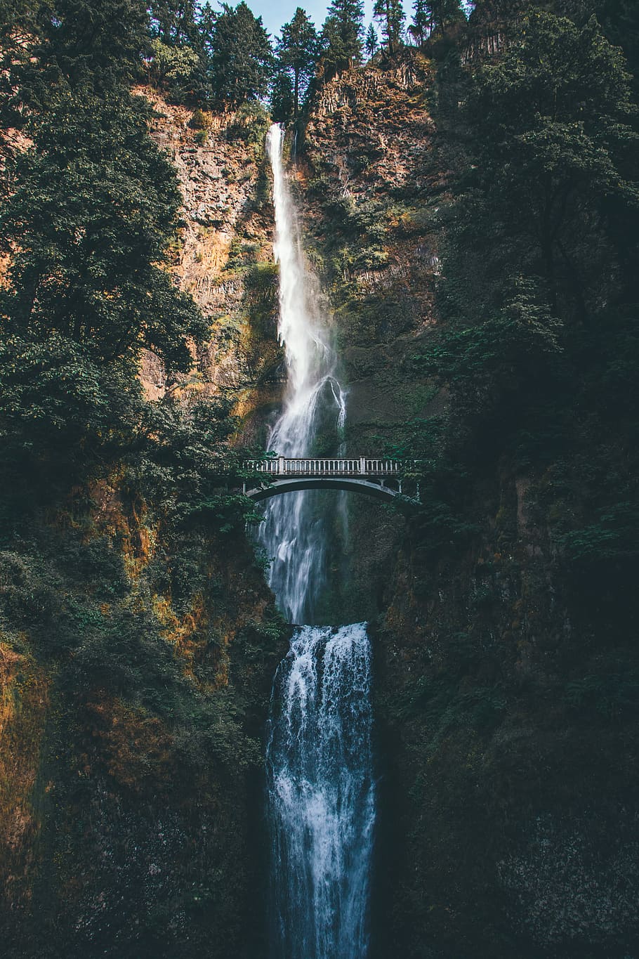 bridge overlooking waterfalls at daytime, cliff, sunlight, shadow HD wallpaper