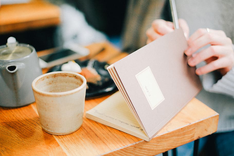 Woman Holding Brown Open Notebook, coffee, composition, container HD wallpaper