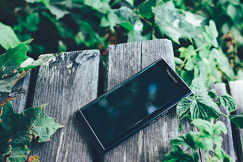 Black Blackberry Priv Smartphone on Brown Board, android, android phone HD wallpaper