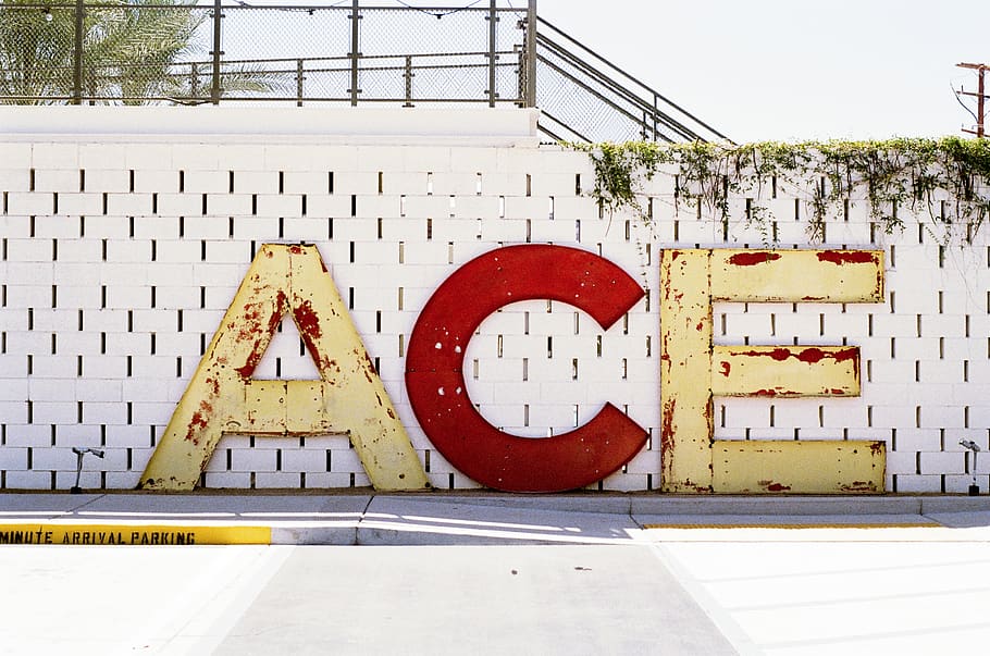 ace, letters, concrete, wall, vines, white, red, sidewalk, street HD wallpaper