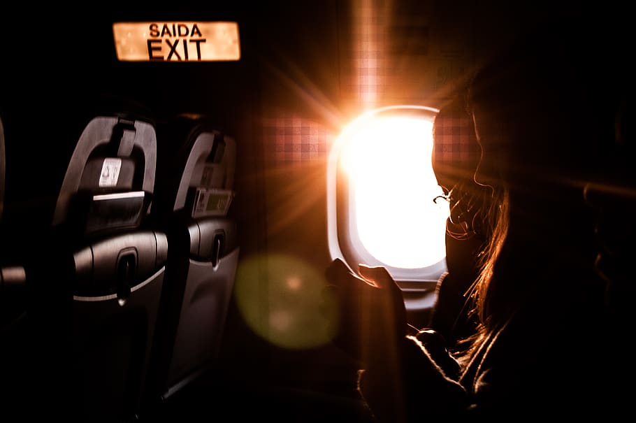 woman inside plane on focus photography, light, flare, lisbon, HD wallpaper