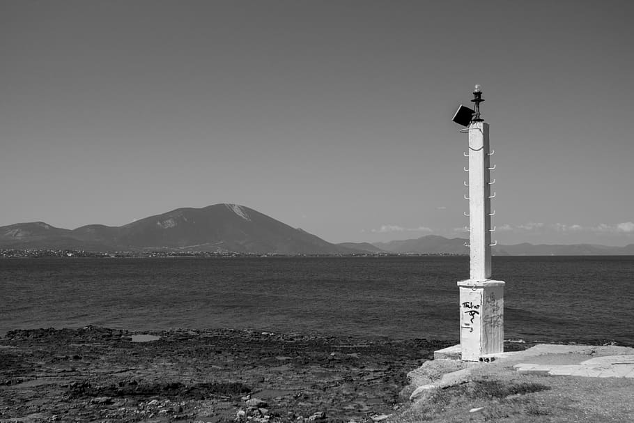 sea, mountain, sky, clouds, pole, beach, water, black and white HD wallpaper