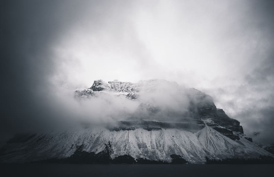mountain, highland, volcano, clouds, fog, nature, black and white HD wallpaper