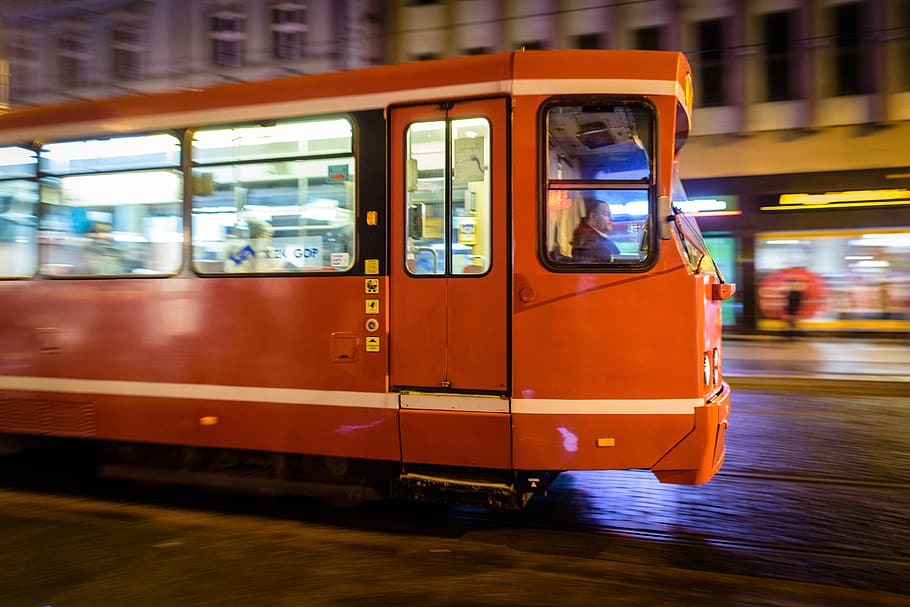 train running on road, poland, night, red, moving, city, tram HD wallpaper