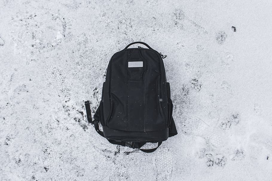 black leather backpack, snow, winter, high angle view, day, nature HD wallpaper