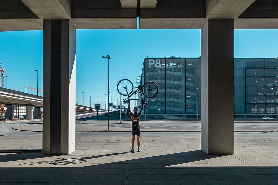 man carrying his bicycle, person, human, transportation, vehicle HD wallpaper