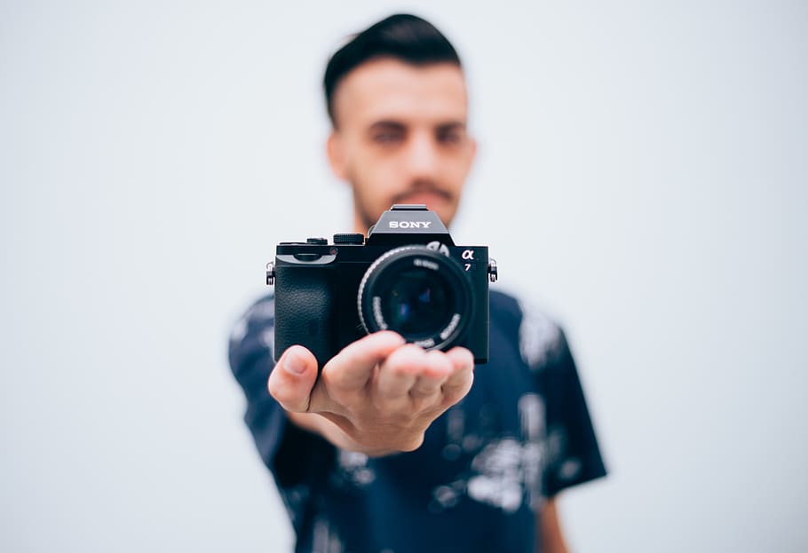 people, man, camera, sony, high tech, mirrorless, dslr, lens HD wallpaper