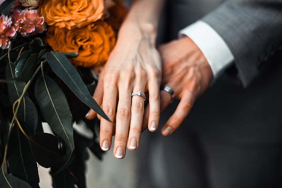 man and woman wearing silver-colored rings, hand, flower, wedding HD wallpaper