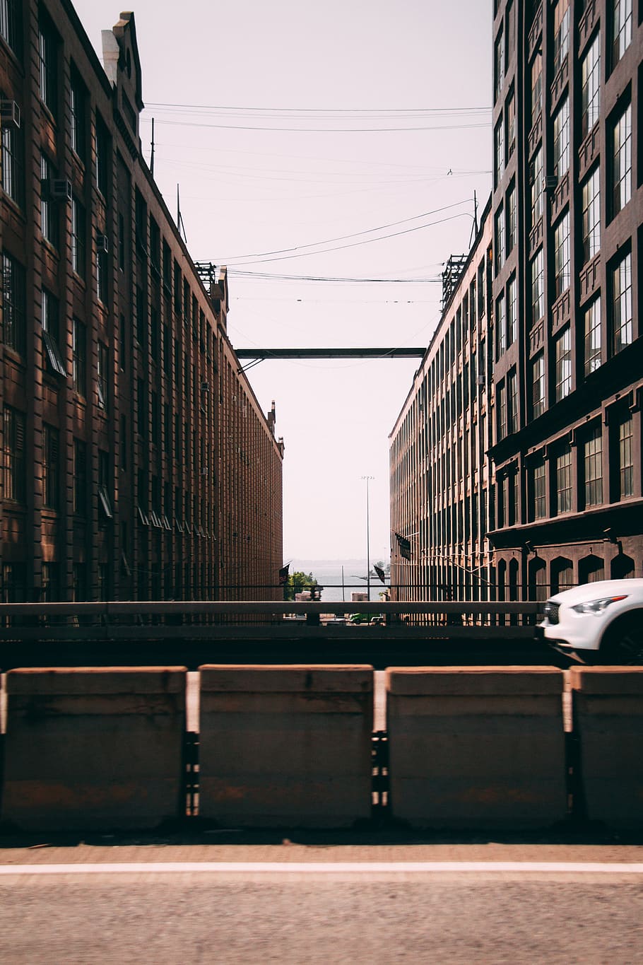 empty road between building during daytime, automobile, vehicle HD wallpaper
