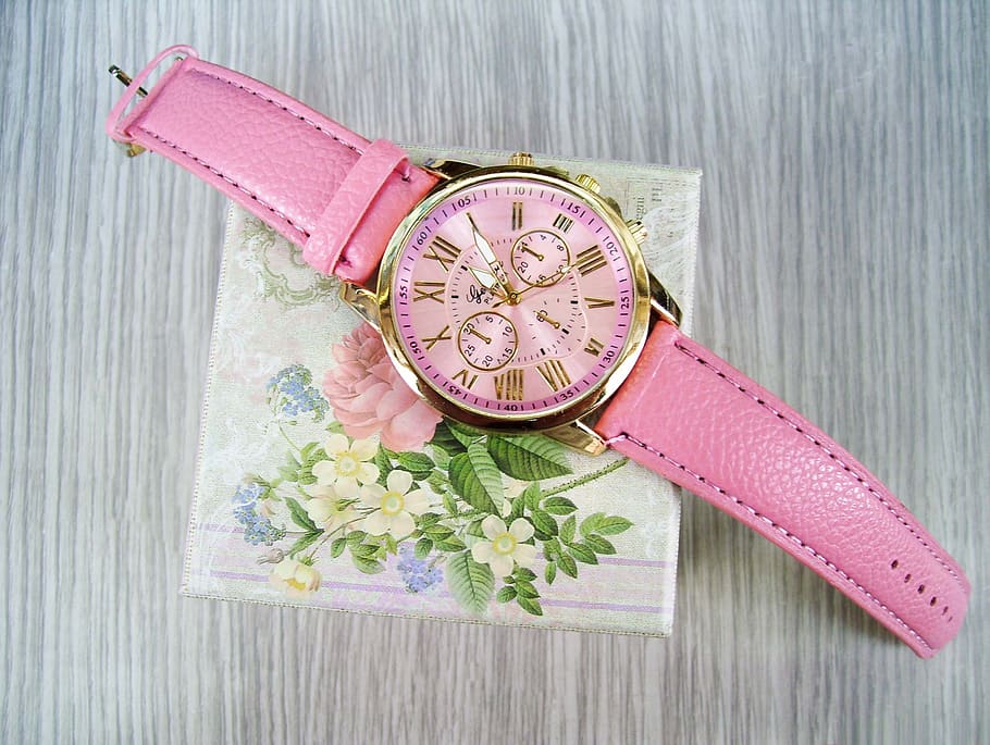 Round Gold-colored Chronograph Watch With Pink Leather Strap on Box HD wallpaper