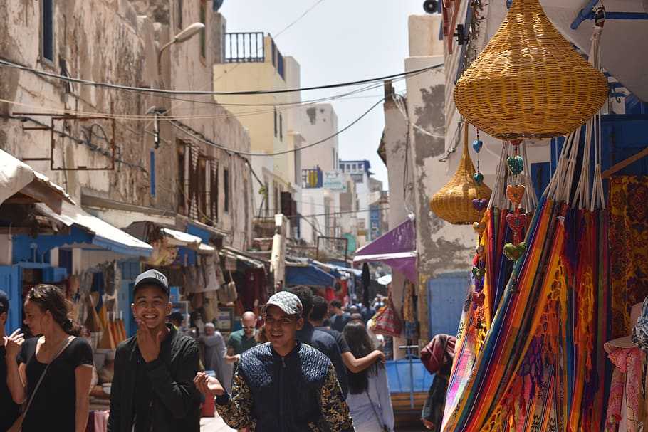man smiling, clothing, apparel, human, person, market, morocco