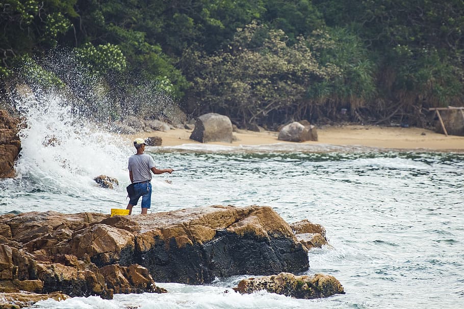 Man Standing On Rocks, hong kong, ocean, person, sea, wave, water HD wallpaper