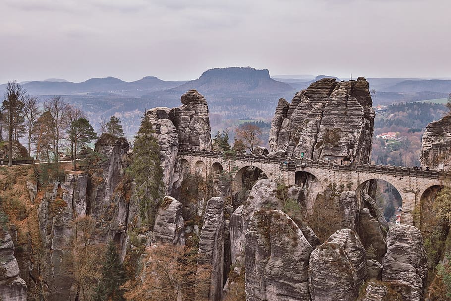 concrete bridge during daytime, nature, outdoors, cliff, ruins HD wallpaper