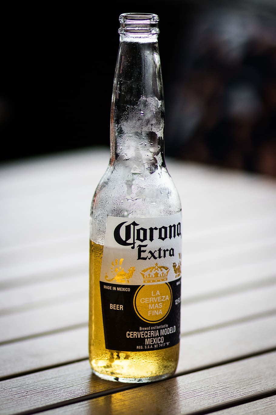 HD wallpaper: half-filled Corona Extra glass bottle, alcohol, beverage, beer  | Wallpaper Flare