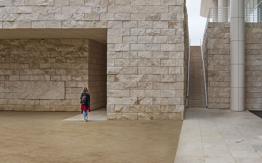 Woman Walking Near Brick Building, architect, architecture, construction HD wallpaper