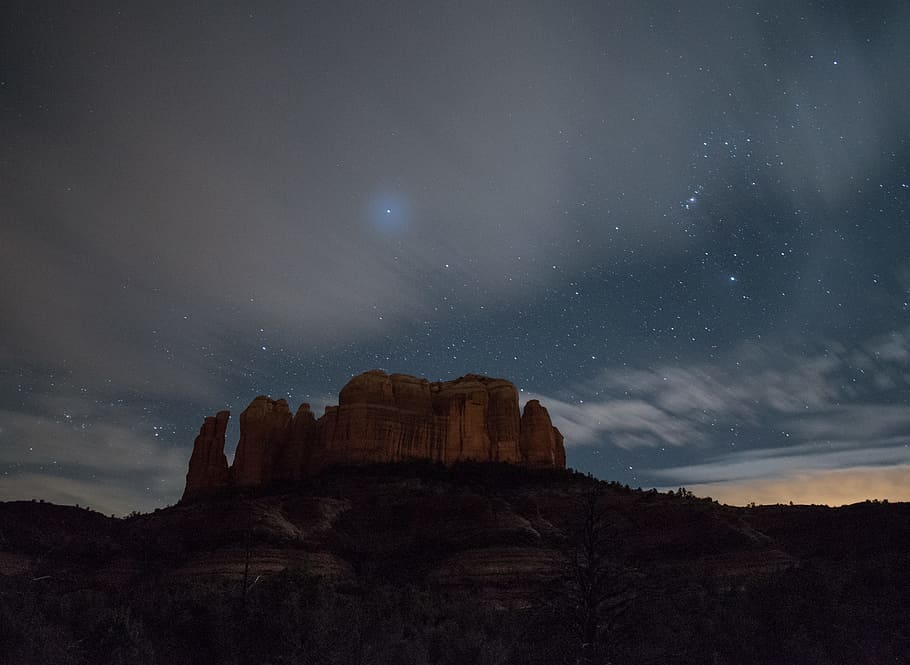 landscape photography of brown canyon under starry night, mountain HD wallpaper