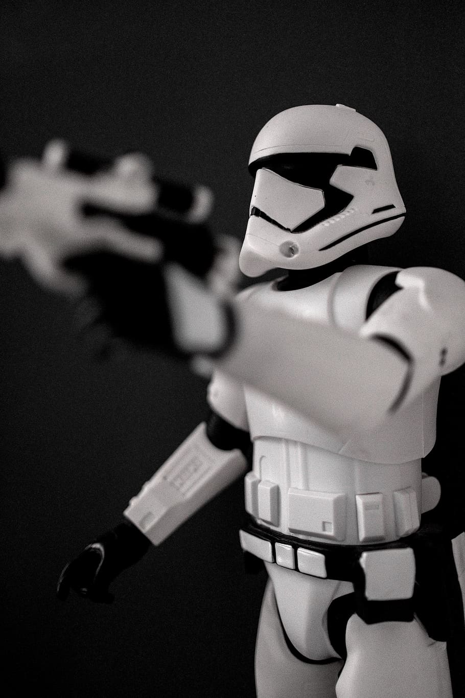 stormtrooper action figure, human representation, holding, indoors HD wallpaper