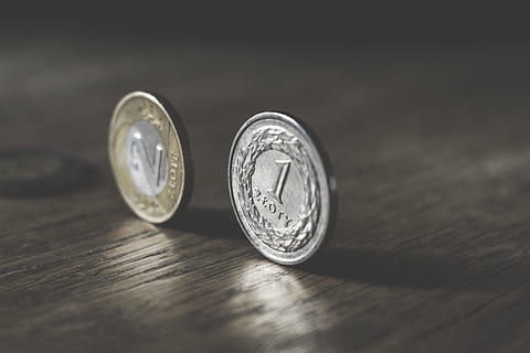 Photo of Two Gold-colored and Silver-colored Coins Standing on Floor HD wallpaper