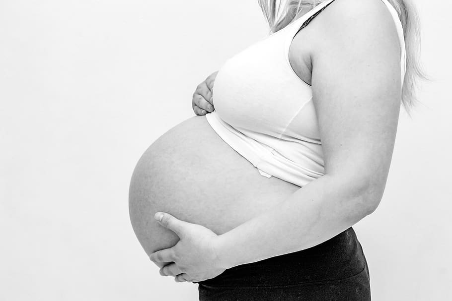 Woman Holding Her Baby Bump, baby belly, black and white, expecting