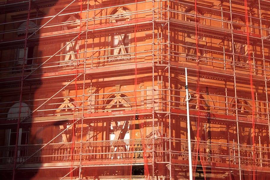 building, city, construction, facade, safety net, scaffold HD wallpaper