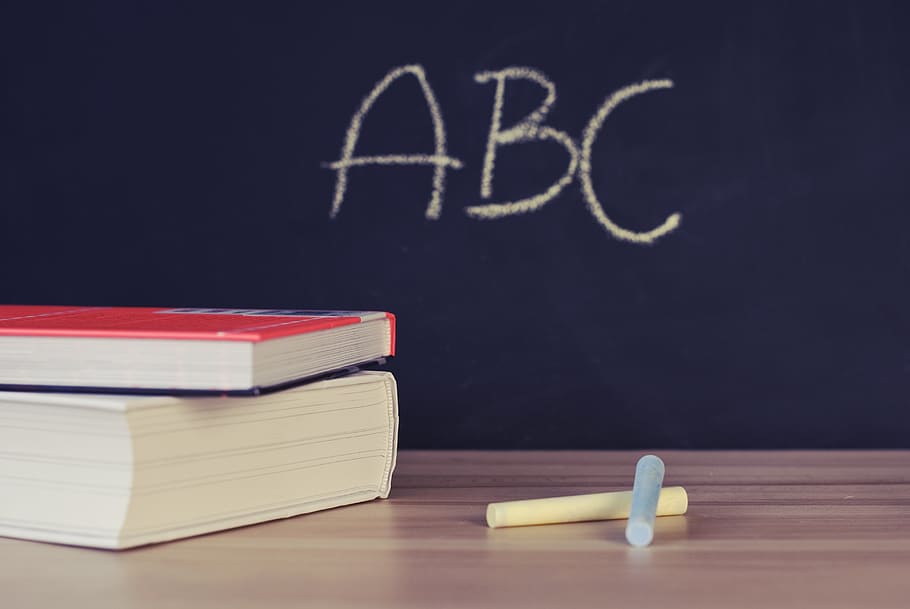 Two Books Beside Two Chalks, abc, alphabet, blackboard, chalkboard, HD wallpaper