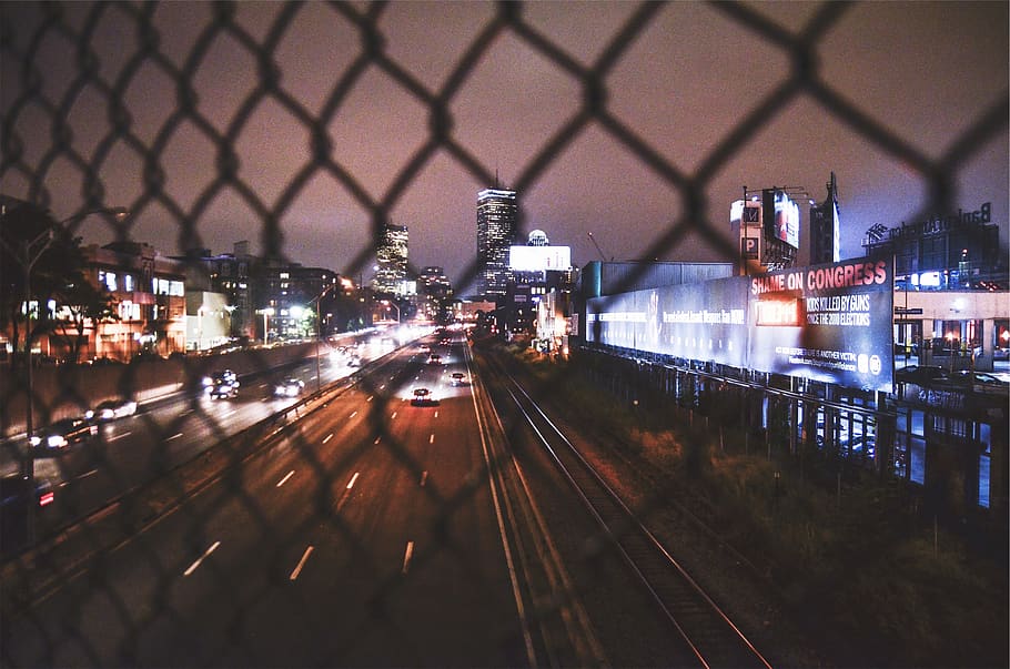 overpass, highway, road, chainlink, fence, billboards, night HD wallpaper