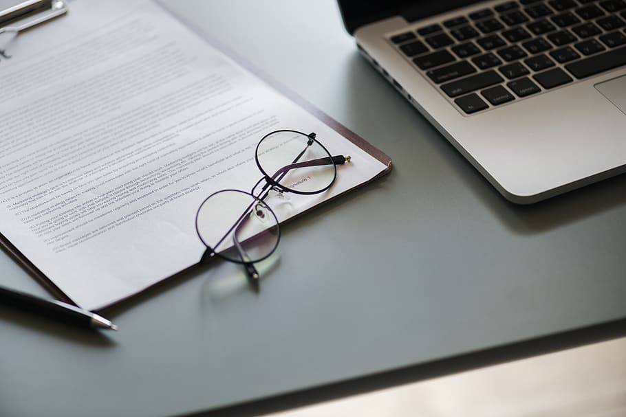 Eyeglasses With Black Frame Beside Macbook Pro, clipboard, close-up HD wallpaper