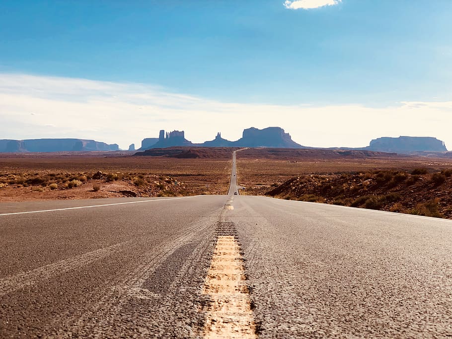 gray asphalt road in between sands, nature, desert, outdoors, HD wallpaper