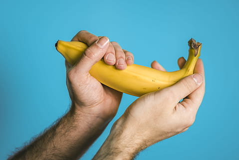 person holding banana, hand, caucasian, yellow, blue, fruit, food HD wallpaper