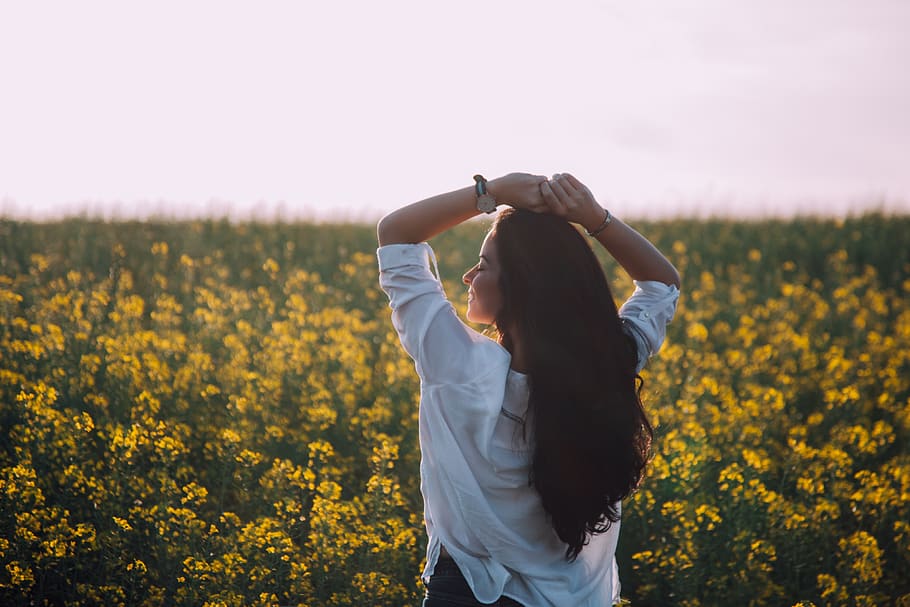 Woman Standing Near Yellow Flowers, back view, blur, care, casual HD wallpaper