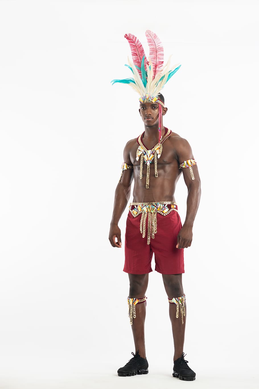 man in red shorts standing, studio shot, white background, one person HD wallpaper