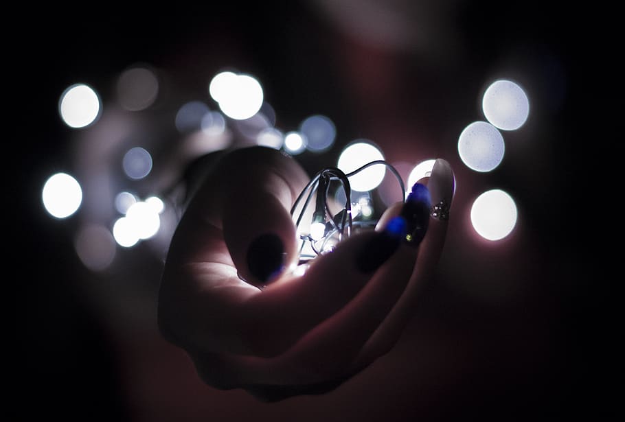 Close Up Photography of Person Holding White String Lights, art HD wallpaper